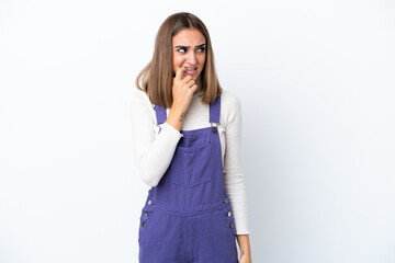 Young caucasian woman isolated on white background nervous and scared