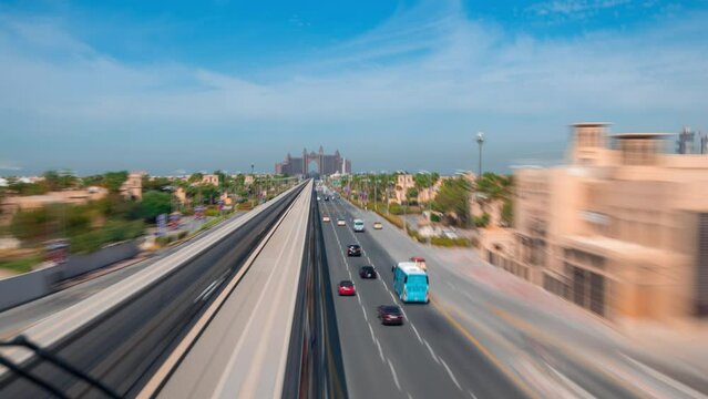 Dubai / UAE-TimeLapse video of  Palm Jumeirah island viewed from Monorail train in high speed hyperlapse video.