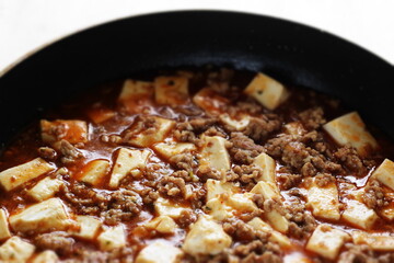 Chinese cooking, Mapo tofu in frying pan 