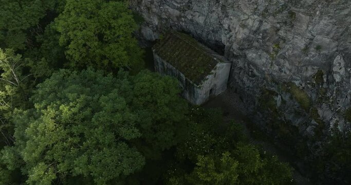 Daba St. George's Church Sheltered In Dense Forest Mountains In Borjomi Municipality, Georgia. Aerial Pullback Shot