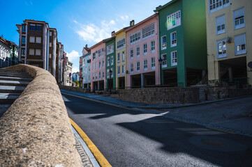 village street with colorful buildings in cudillero