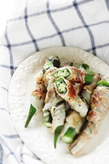 Asian food, Okra and belly pork roll fried with  copy space