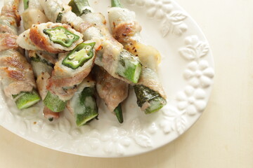 Asian food, Okra and belly pork roll fried with  copy space