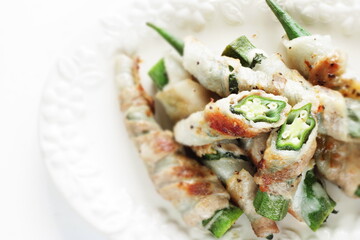 Asian food, Okra and belly pork roll fried with  copy space
