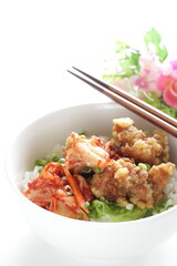 Korean style cafe food, fried chicken and Kimchi on rice with spring onion