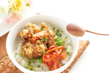 Korean style cafe food, fried chicken and Kimchi on rice with spring onion