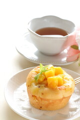 Freshness mango and herbal bun with English tea