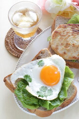 Pan fried Swordfish fillet in sandwich for homemade breakfast