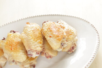 Chinese food, pan fried chicken wings on plate 