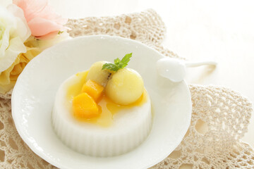 Kiwi fruit and mango on white Milk Kanten Jelly for Asian sweet dessert image