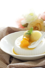 Kiwi fruit and mango on white Milk Kanten Jelly for Asian sweet dessert image