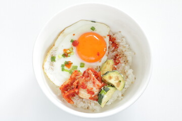 Korean food, deep fried zucchini and Kimchi with sunny side up fried egg on rice