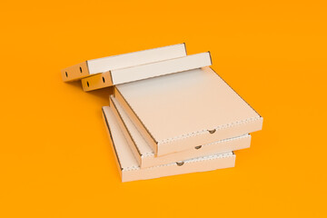 pizza boxes on yellow background