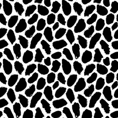 Geometric abstract seamless pattern with blots. Hand drawn black dots texture. Bold stains and irregular dots of different size texture. Modern seamless black and white ink stains pattern. 