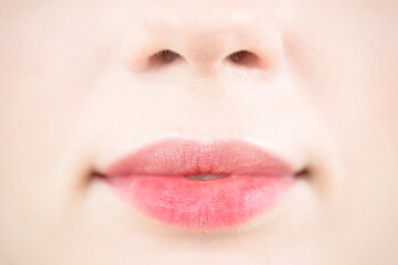 Natural lips close up, perfect clean skin.