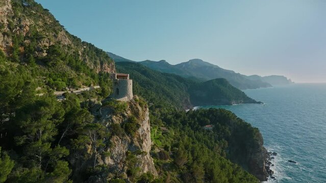 Beautiful aerial view of Torre de Verger in Banyalbufar, tourist city of Mallorca, Drone, Es Port des Canonge, Serra de Tramuntana , Spain