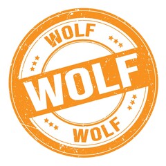 WOLF text written on orange round stamp sign