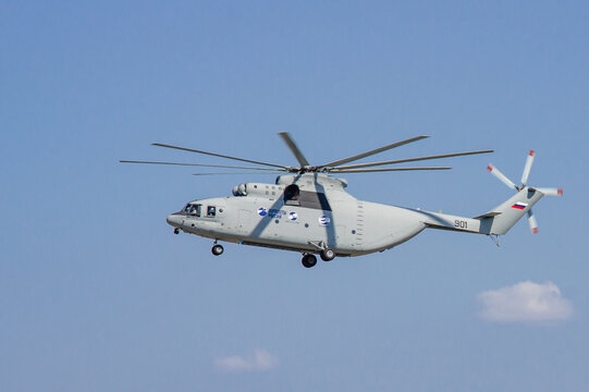 World's largest serial military transport helicopter Mi-26 (according to NATO codification: Halo) performs aerobatics. MAKS-2011. Powerful propeller spins fast. Zhukovsky, Russia - August 16, 2011