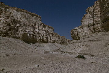 white rocks of Nahal Pratsim canyon under moonlight