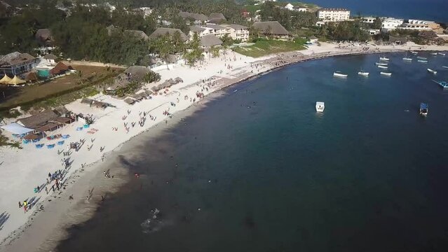 Aerial view of popular Kenyan travel destination. Pristine tropical beach with resort and hotel buildings, Watamu Beach