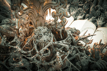 Wat Rong Khun is a white Buddhist temple located near the city of Chiang Rai in Thailand