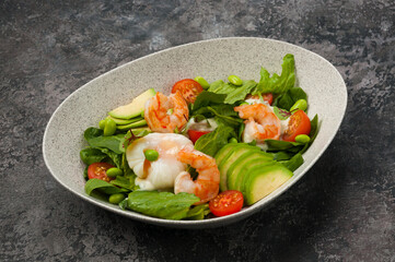 salad with shrimp, avocado, beans and poached egg