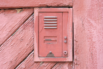 Simple old fashioned retro vintage entry phone with two blank empty name plates and door bell buttons, old apartment entrance concept, double condo. Old buildings, residential area, front view