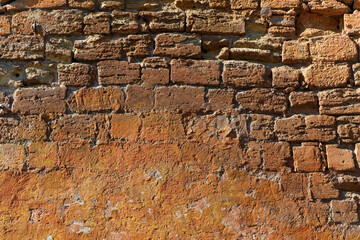 Texture of old stone wall in brown color