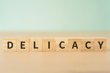 デリカシー・繊細さのイメージ｜「DELICACY」と書かれたブロック
