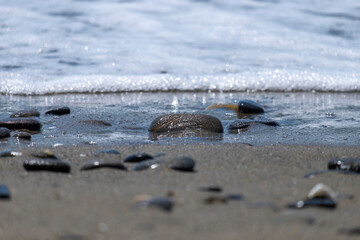 Background of small stones by the beach