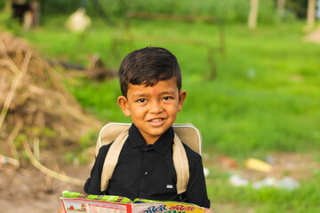 Indian smiling happy boy kid school boy 5 years old in shirt backpack
