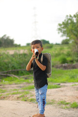 kid schoolboy with holding backpack standing outside,childhood children kids education lifestyle concept,