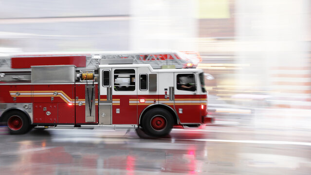 Red fire truck in motion