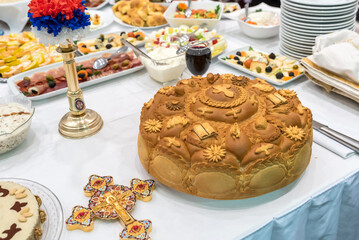 Christian ortodox bread on traditional ortodox ceremony table