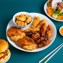 Fried Chicken Wings Nuggets Sauce Drizzled Food Photography Green Chopsticks Backdrop Advertisement Editorial