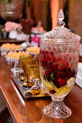 tea and sweets ,glass of tea, table setting, glass dirt bin