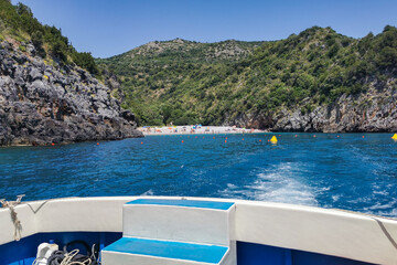 Scenic landscape with cliffs and caves along the Cilento coast, Campania region, Italy