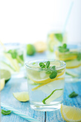 Glasses with lemon and lime lemonade