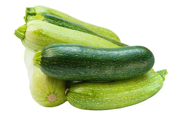 fresh zucchini on a white background. delicious green vegetables on the table. appetizing zucchini on a light texture. healthy food concept