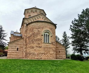 View of an old Manastir Zica and a garden with trees