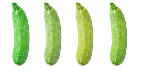 fresh zucchini on a white background. delicious green vegetables on the table. appetizing zucchini on a light texture. healthy food concept