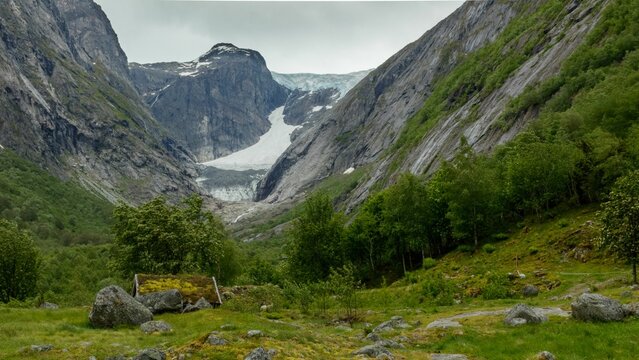 Scenic view of the Brenndalsbreen glacier in a narrow valley in Norway