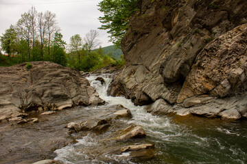 Obraz premium Waterfall on a mountain river in Sheshory