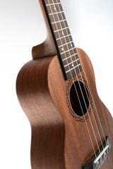 Fototapeta premium Ukulele soundboard with strings on white background