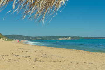 Fototapeta na wymiar White sand beach with crystal clear azure sea water in Bulgaria. Black sea