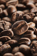 Roasted coffee beans macro close up background