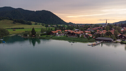 Typical Bavarian town in a colorful evening seen from drone view