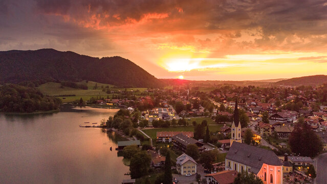 Typical Bavarian town in a colorful evening seen from drone view