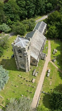 Aerial view of St. Andrews Church in Bainton, Yorkshire, England
