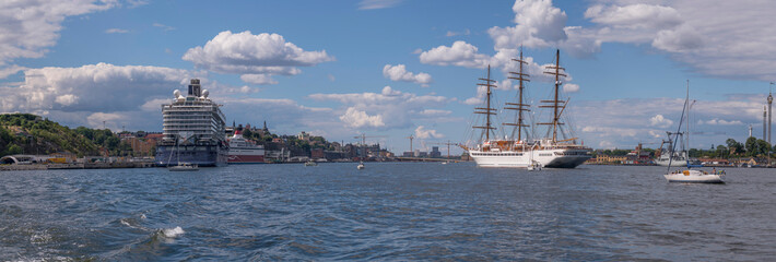 Large cruise sail ship arriving, cruise ships at a pier, a sunny summer day in Stockholm